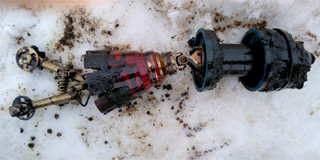 Inspecting the caliper after removing it from the receiving chamber